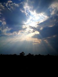 Scenic view of silhouette landscape against sky at sunset