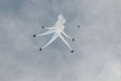 Low angle view of airshow in sky