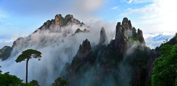 Panoramic view of clouds over mountain