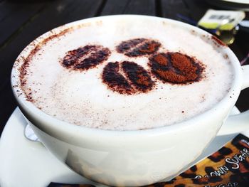 Close-up of cappuccino on table