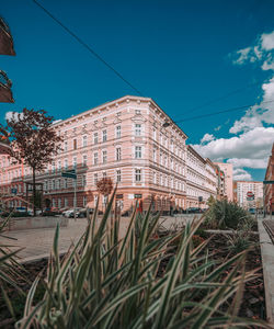 Buildings in city against sky