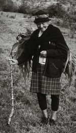 Portrait of man standing on field