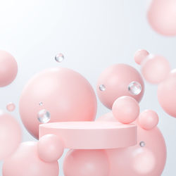 Close-up of pink water over white background