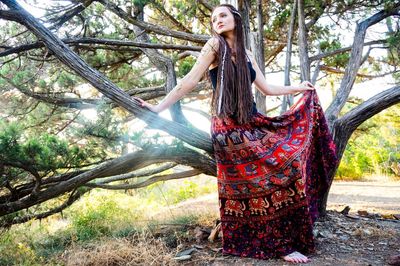 Portrait of young woman in forest