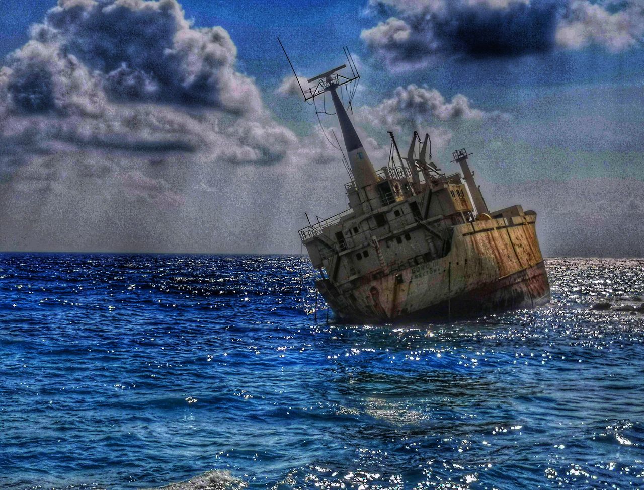ABANDONED SHIP IN SEA