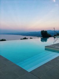 Scenic view of swimming pool against sky