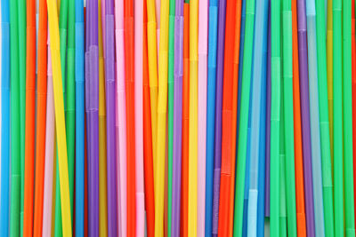 Full frame of colorful drinking straws