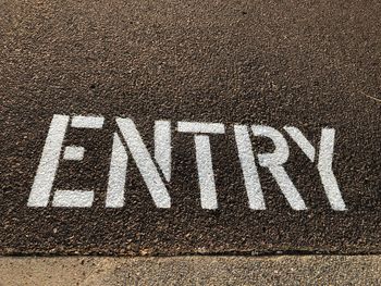 High angle view of text on road