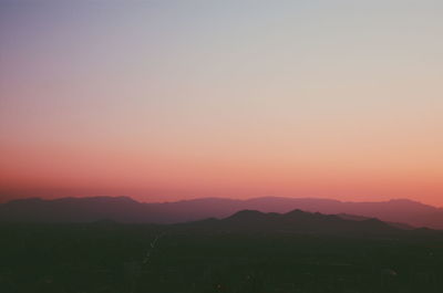 Scenic view of mountains against sky during sunset