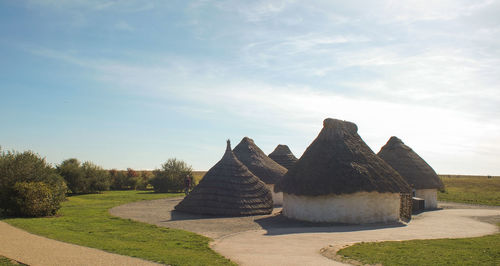 Stone structure in park against sky