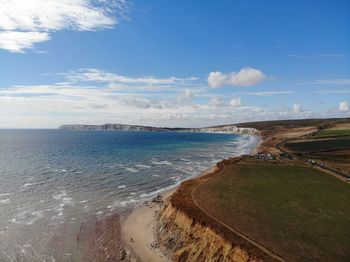 Scenic view of beach against sky