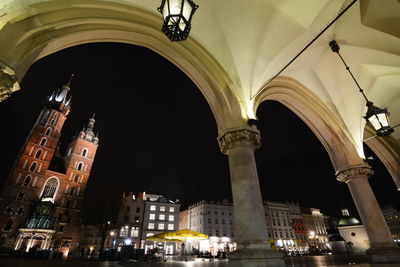 Low angle view of illuminated buildings at night