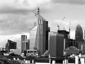 Modern buildings against sky in city