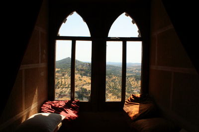 Low section of people relaxing on window