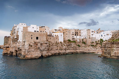 Polignano a mare. town on the cliffs, puglia region, italy, europe. traveling concept background 