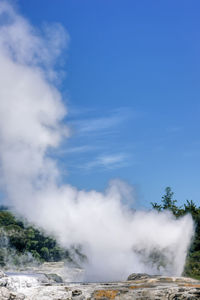Scenic view of clouds over mountain