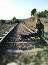 Man on railroad track