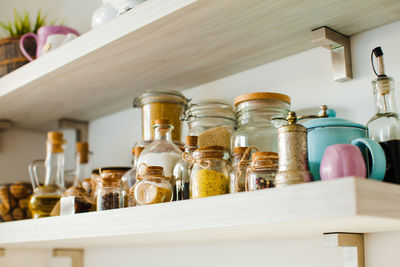 Close-up of glass bottles on table