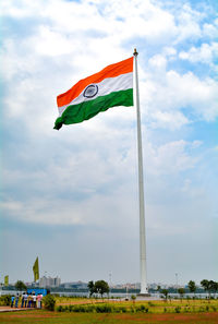 Low angle view of flag against sky