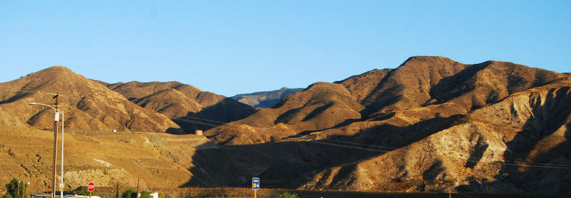 Scenic view of mountains against clear sky