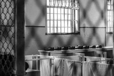 Empty chairs and table in building