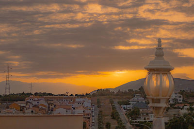 High angle view of cityscape against sky during sunset