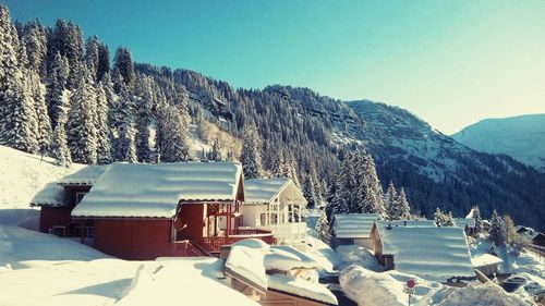 Scenic view of snowcapped mountains against sky