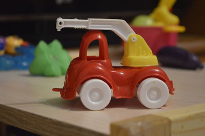 Car. children's car. two wheels white cars.children's toys.plastic toy.red yellow color car.