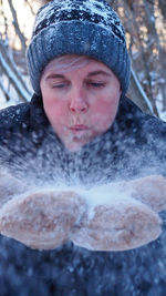 Portrait of man in snow