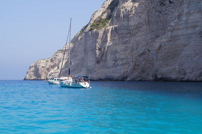 Nautical vessel on sea against sky