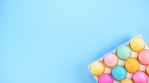 Directly above shot of pills against blue background