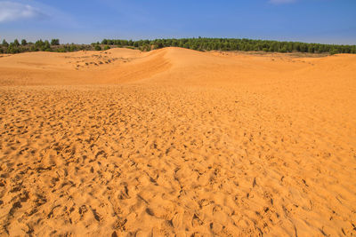 Scenic view of desert against sky