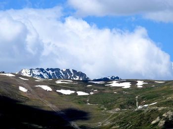 Scenic view of snowcapped mountains against sky