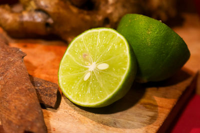 High angle view of lemon slice on cutting board