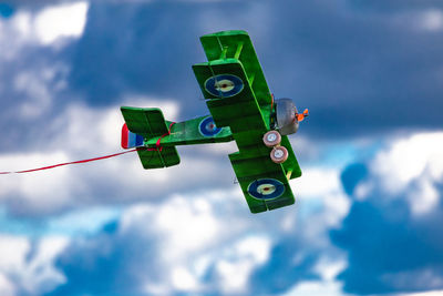 Low angle view of security camera against sky