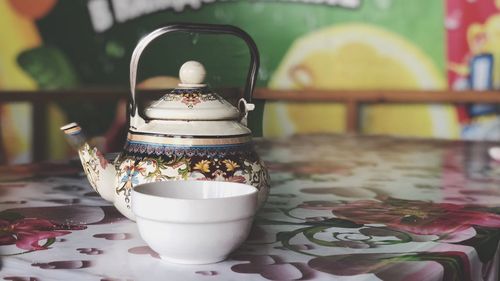 Close-up of tea cup on table