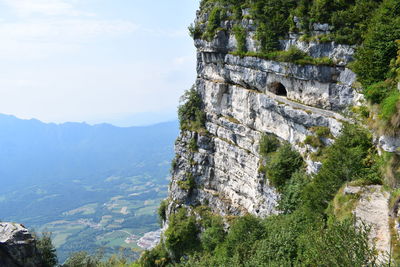 Castle on mountain against sky