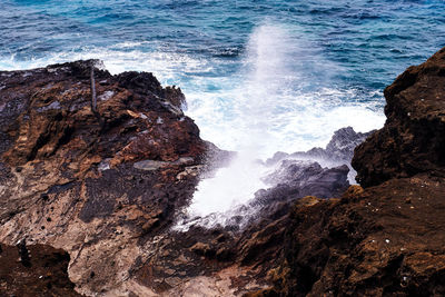 Scenic view of rocks in sea