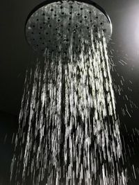 Low angle view of fountain against sky