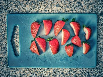 High angle view of strawberries on table