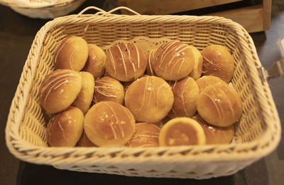 High angle view of candies in basket on table