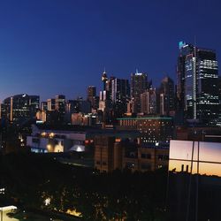 Illuminated cityscape at night