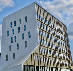 Low angle view of modern building against sky