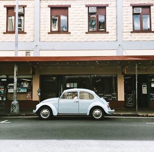 Vintage car on road in city