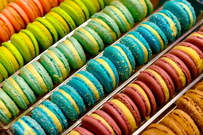 Full frame shot of multi colored macaroon for sale in market