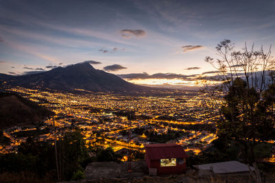 Scenic view of mountains against sky at sunset