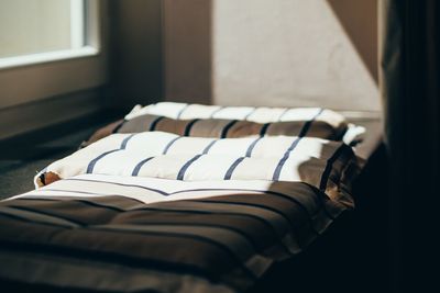 Sunlight falling on pillows