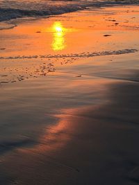 Scenic view of sea against sky at sunset