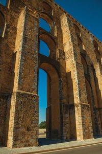 Low angle view of historical building against sky