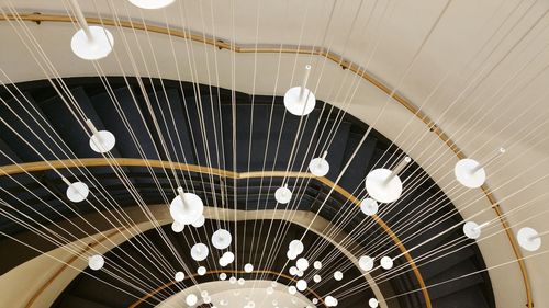 High angle view of chandelier hanging over staircases